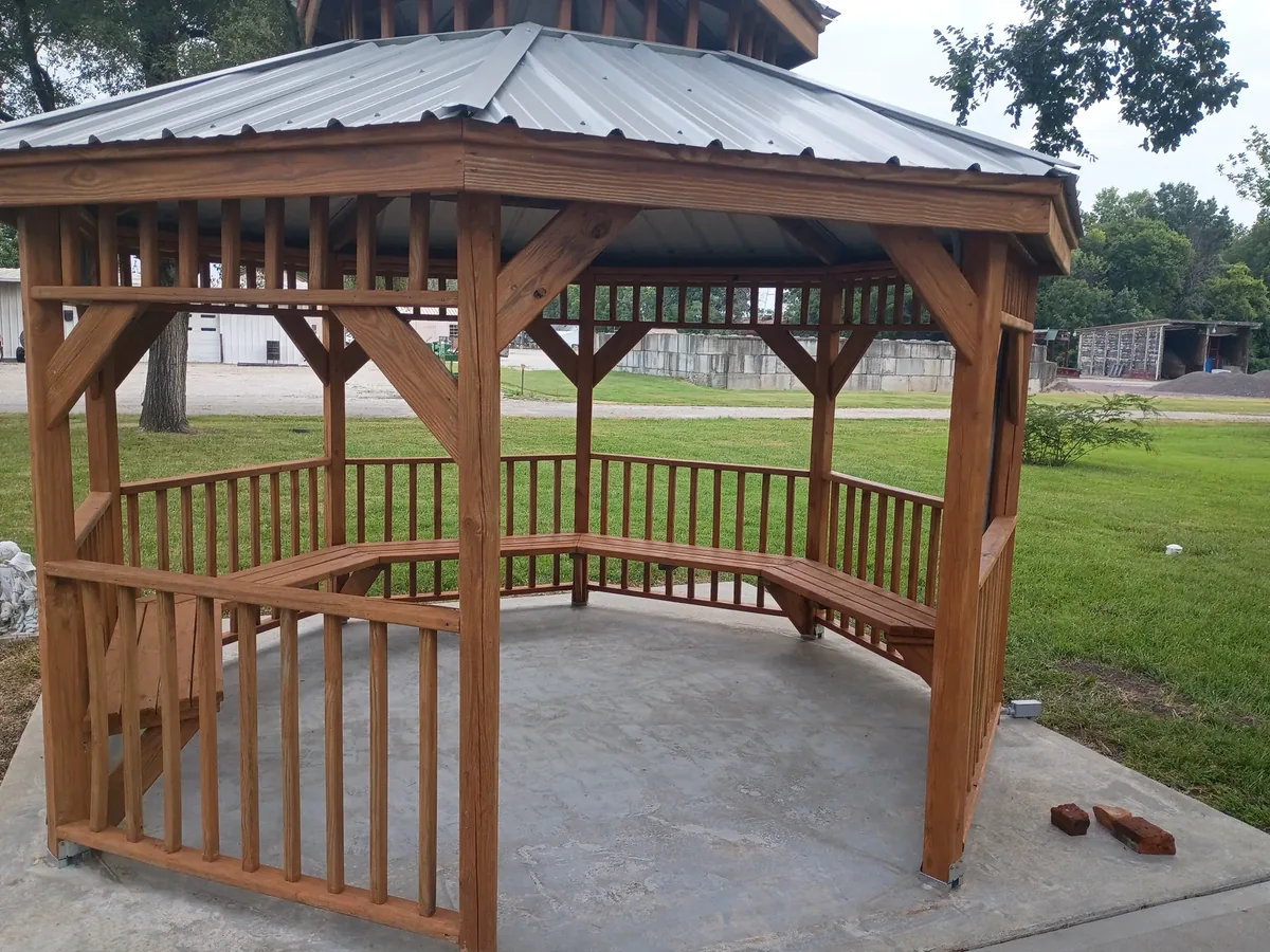 restored gazebo finished in warm wood stain