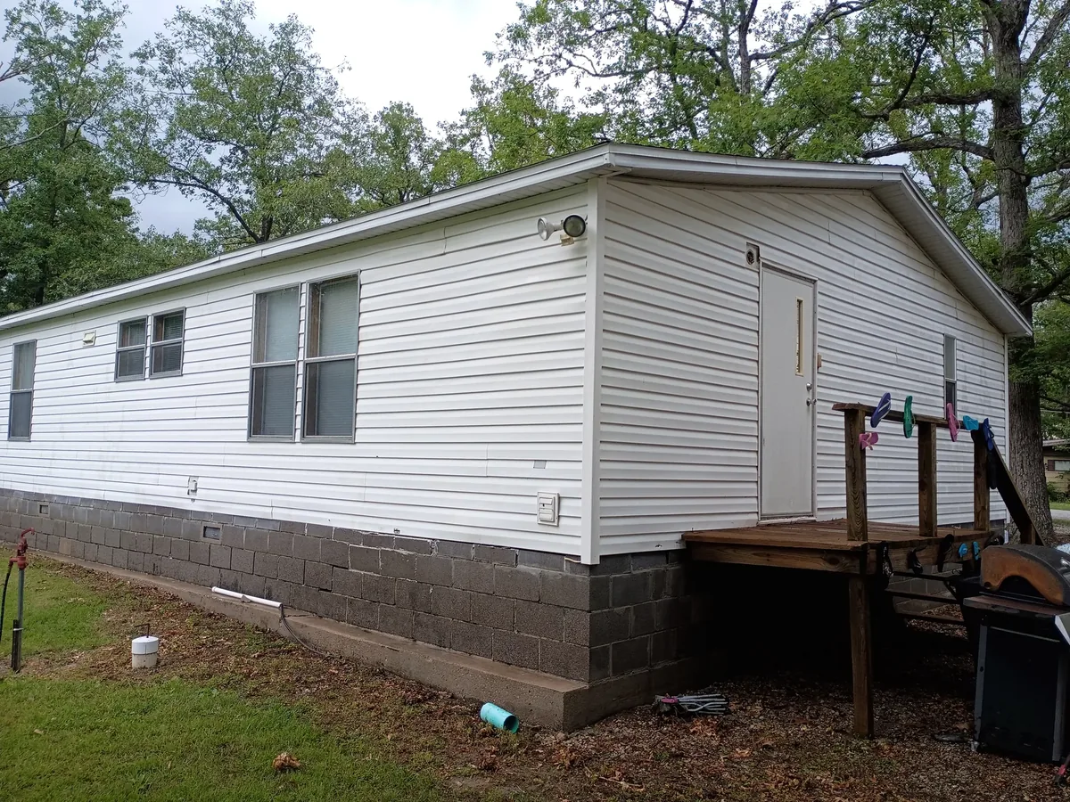 long house wall clean after soft washing