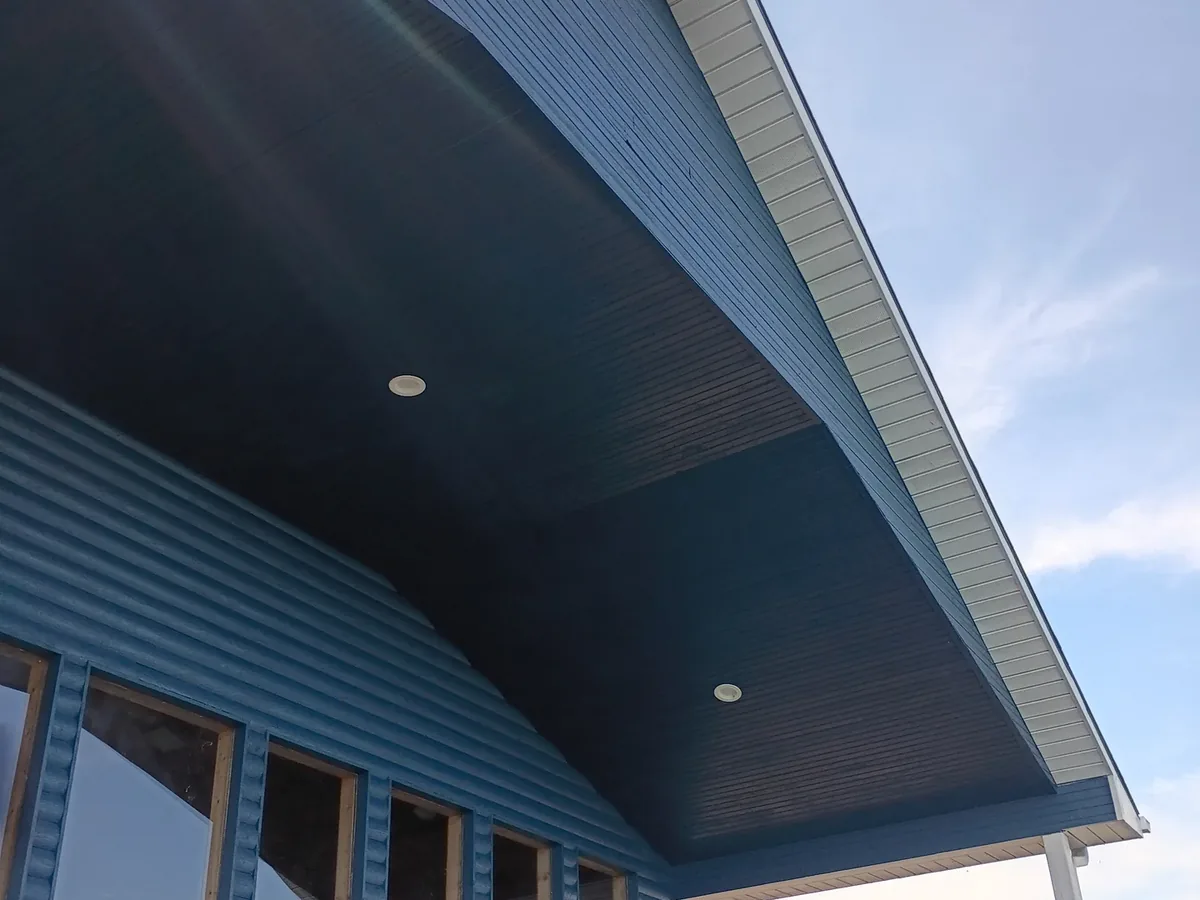 soffit and siding painted deep navy
