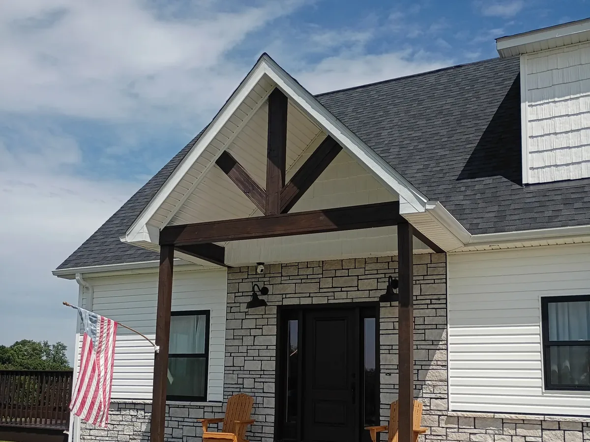 covered entry with stained and sealed timber posts
