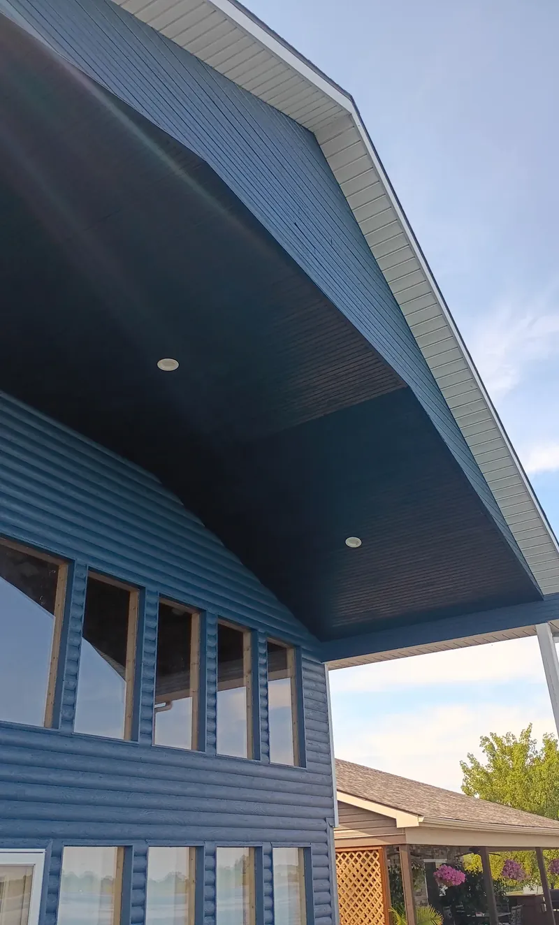 soffit and siding finished in deep navy